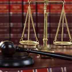 Law books and scales of justice